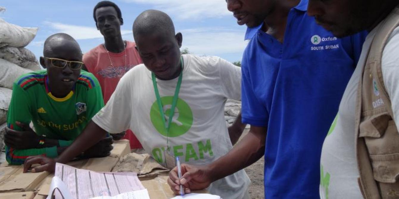 Oxfam Humanitarian Aid Workers in South Sudan help keep hope alive helping people like themselves. Photo credit: Oxfam